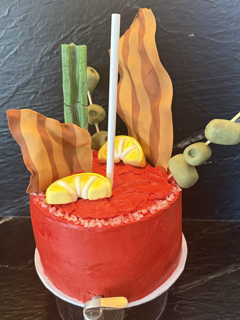 Close view of the toppers: fondant bacon, lemon wedges, celery, olives and the sugar rim